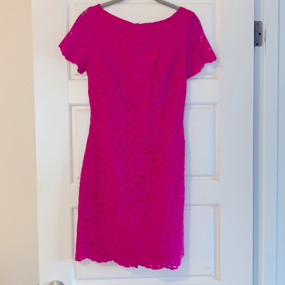 A hot pink lace dress by ALEXI ADMOR IN an XS. This is GORGEOUS!!